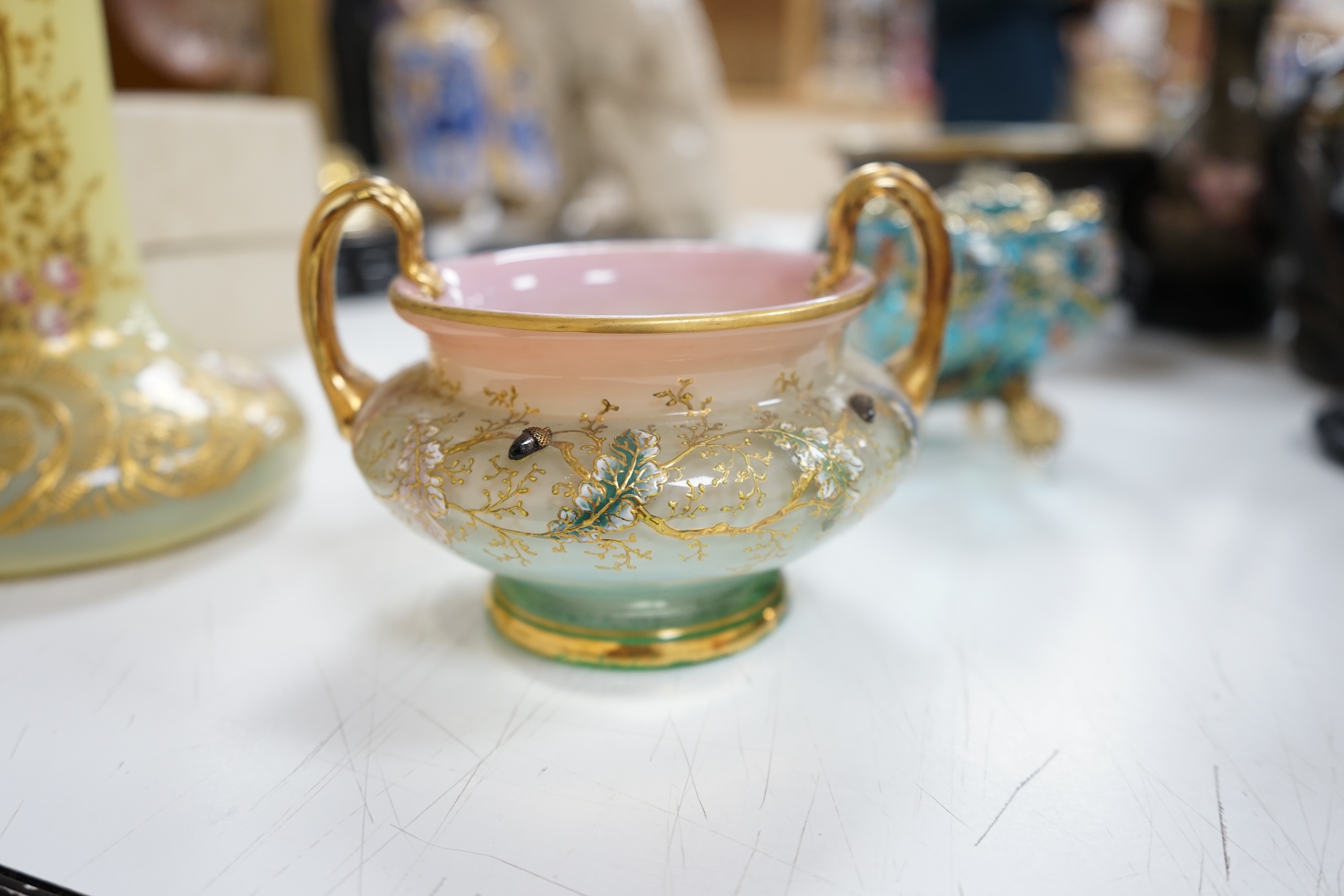 Three Bohemian gilt decorated glass vessels, including two Moser bowls and a tall Vaseline vase, 34.5cm high. Condition - good.